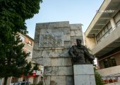 Monument in pedestrian street in Korça